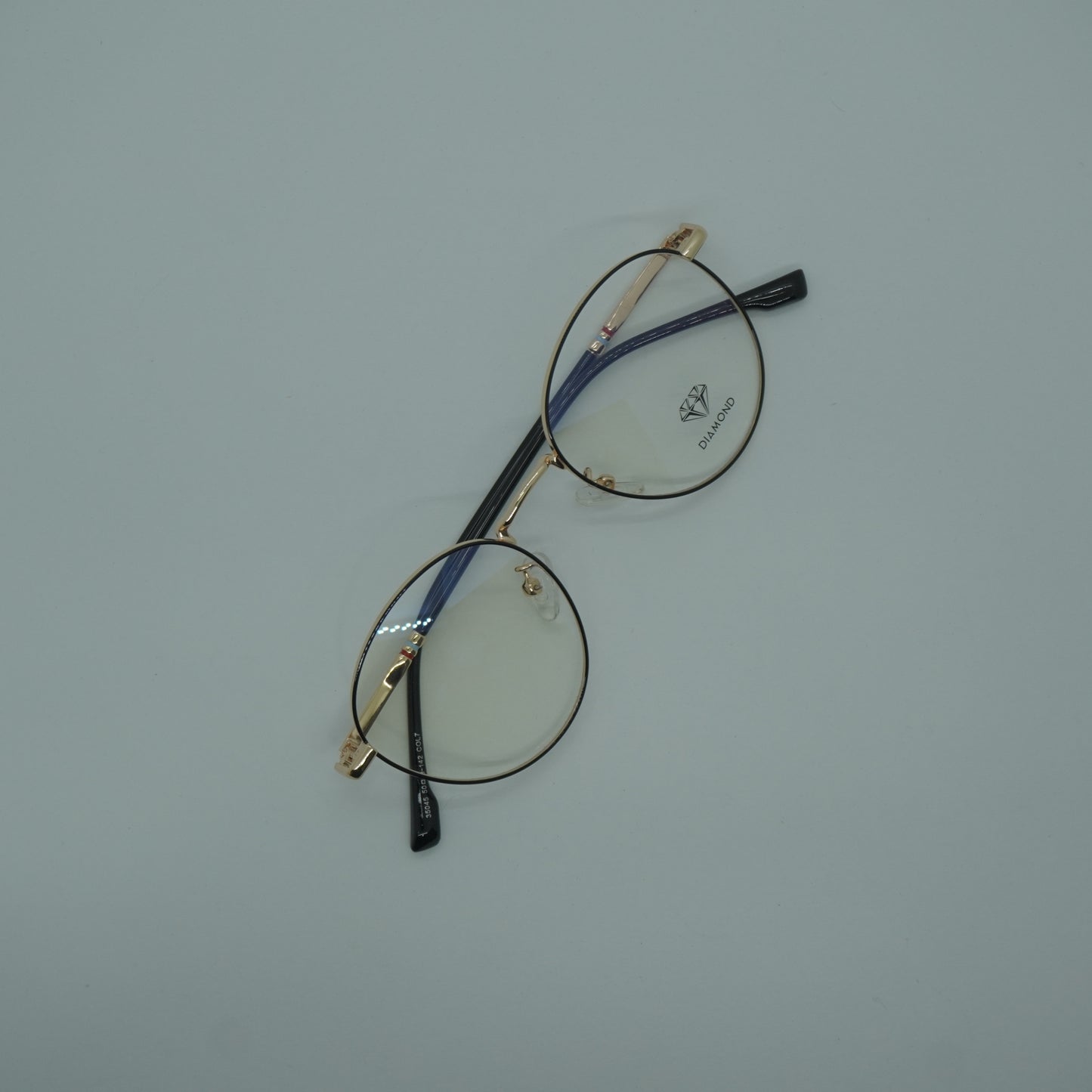 Montura Unisex - Metalica Dorada+ lente formulado.