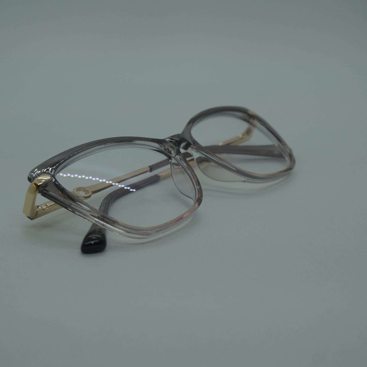 Montura Mujer - Traslucida Gris Rosada+ lente formulado.