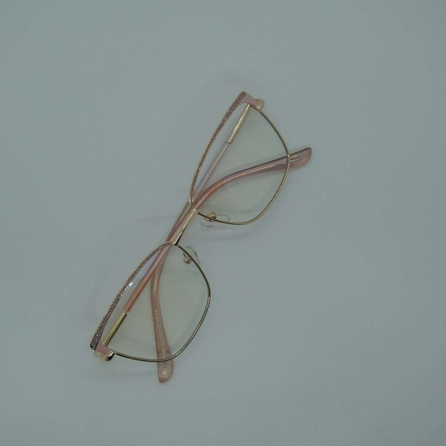 Montura Mujer - Metalica Rosada Brillos+ lente formulado.