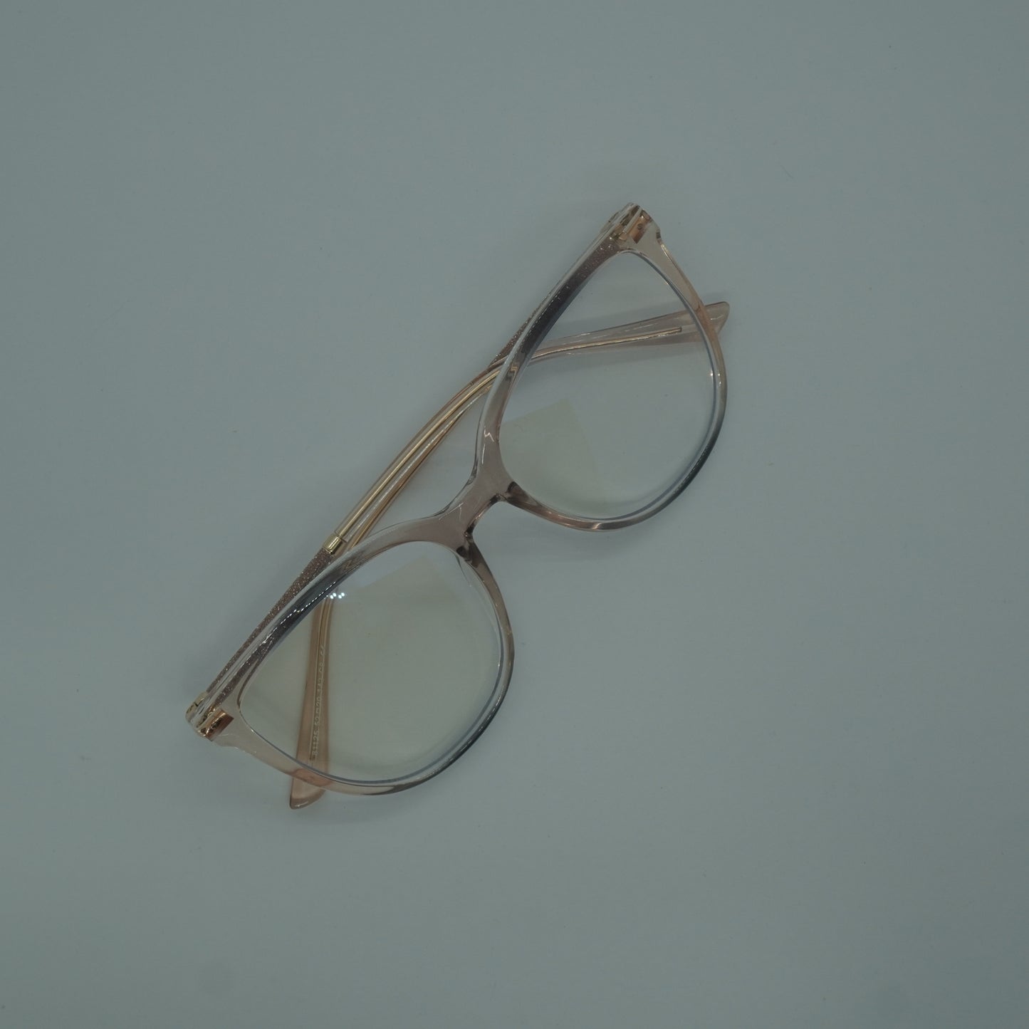 Montura Mujer - Traslucida Palo de rosa + lentes formulado