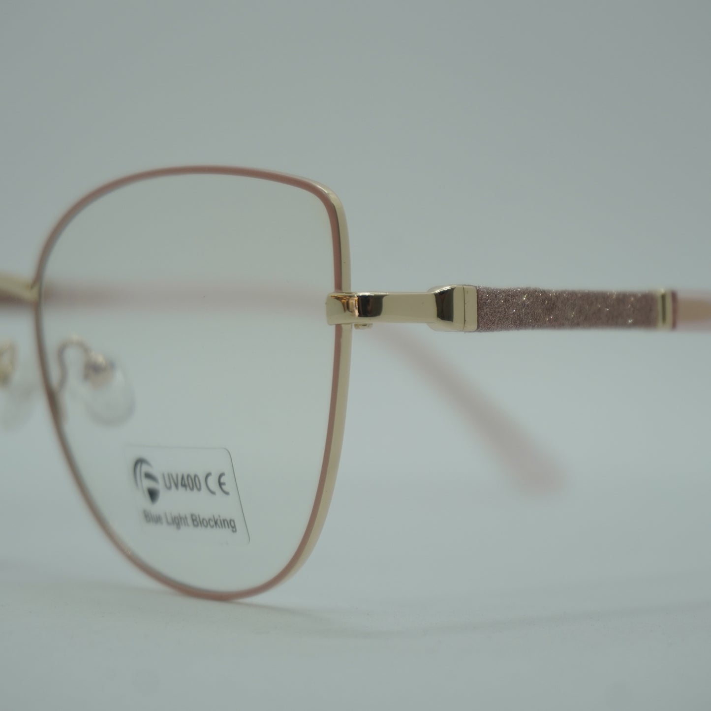 Monturas Mujer - Rosada Metalica+ lente formulado.
