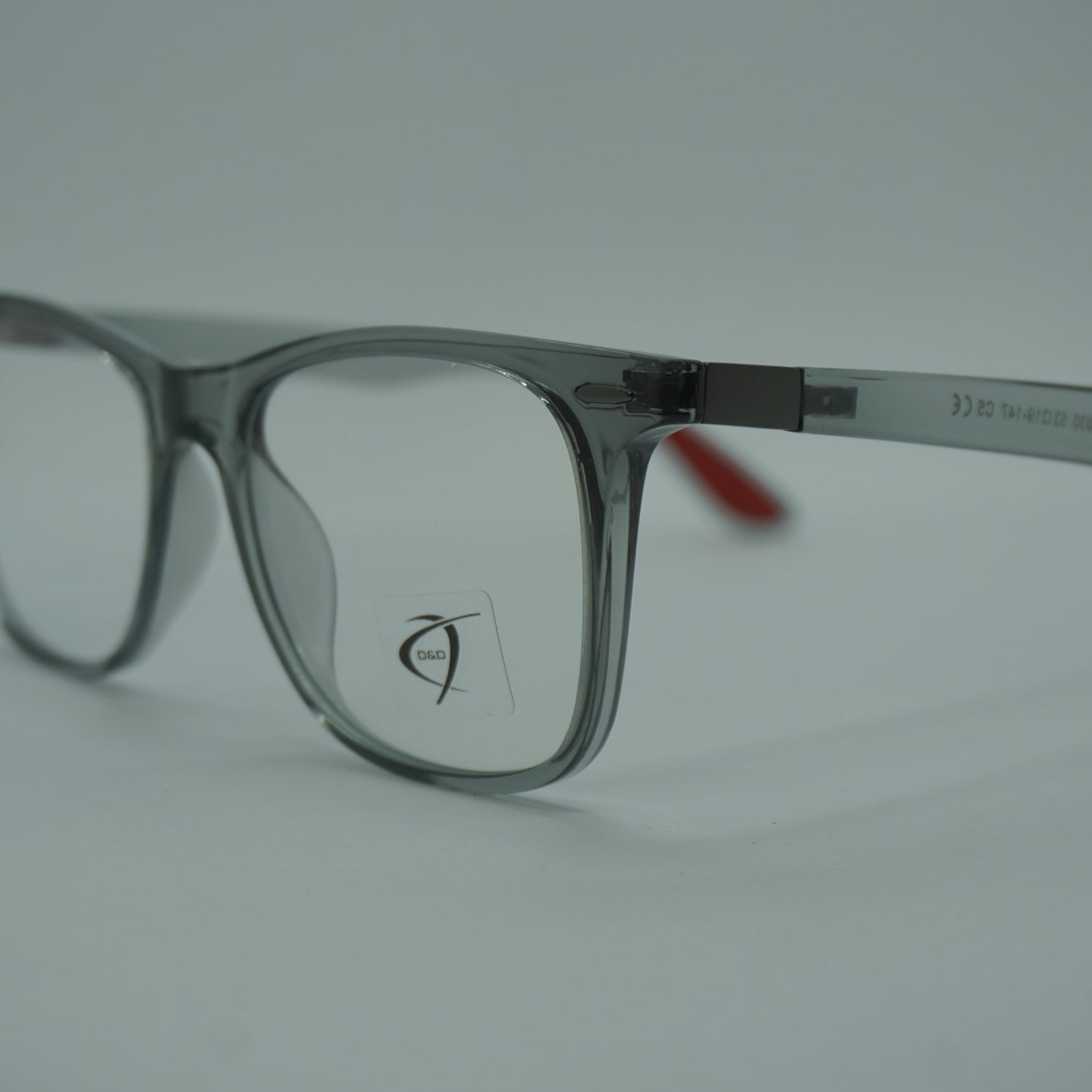 Montura Unisex - Gris Traslucidas+ lente formulado.