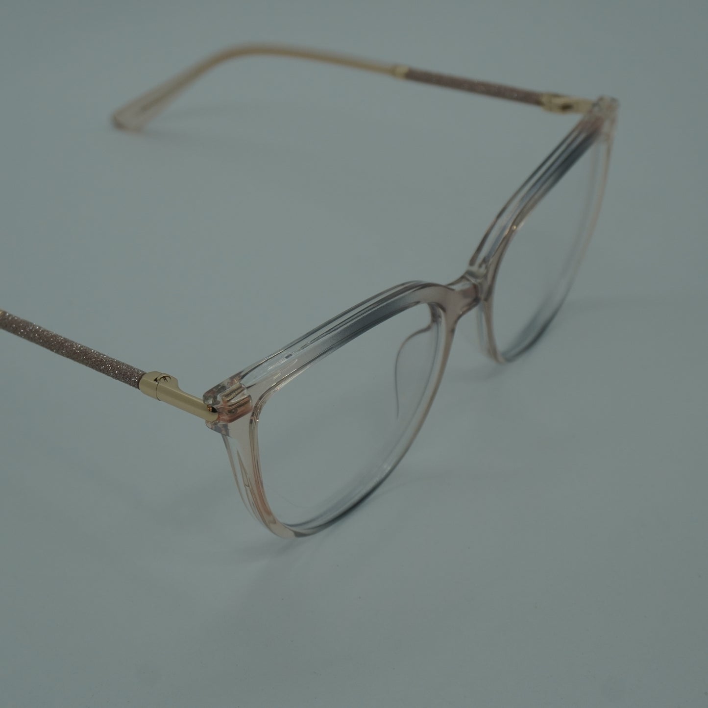 Montura Mujer - Traslucida Palo de rosa + lentes formulado
