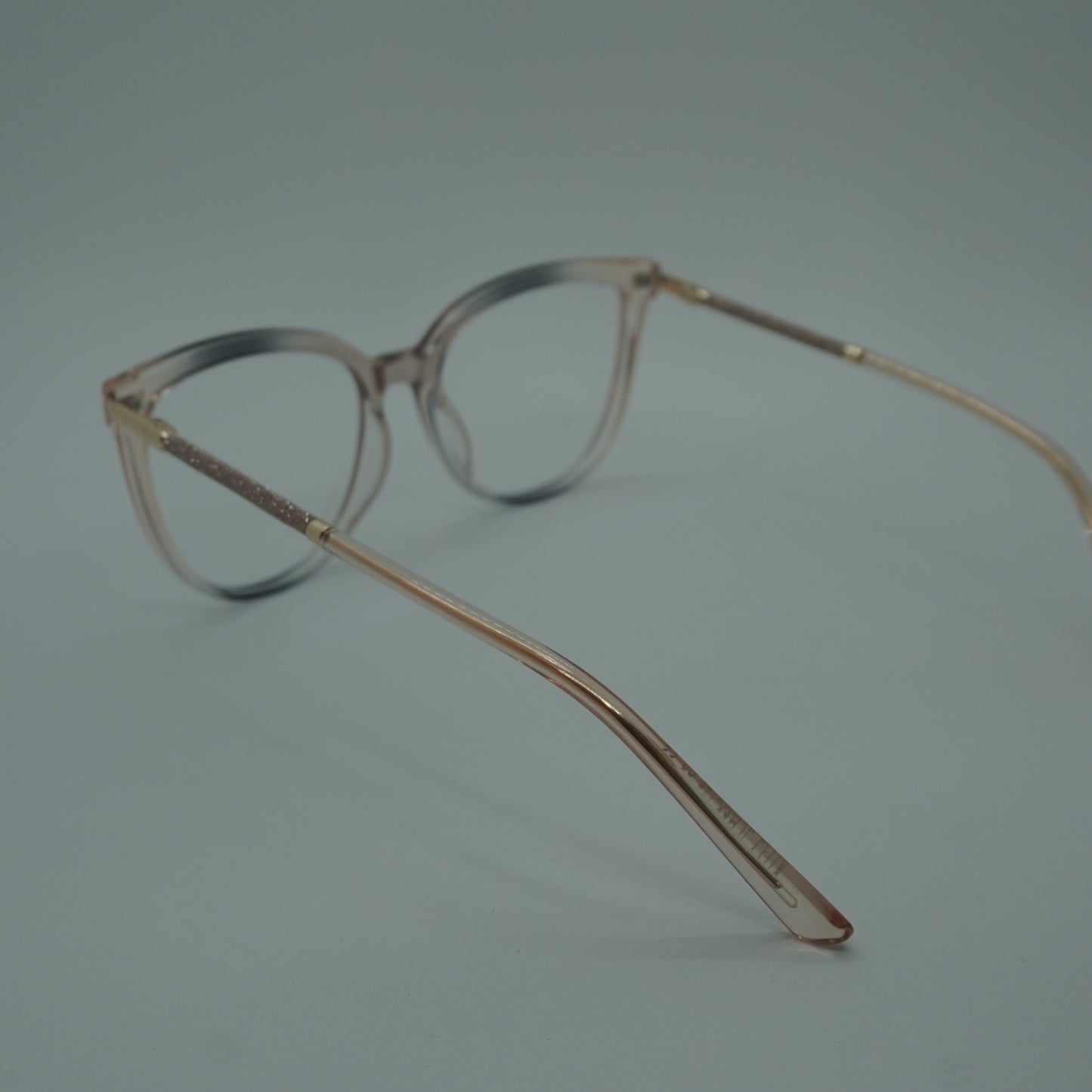Montura Mujer - Traslucida Palo de rosa + lentes formulado
